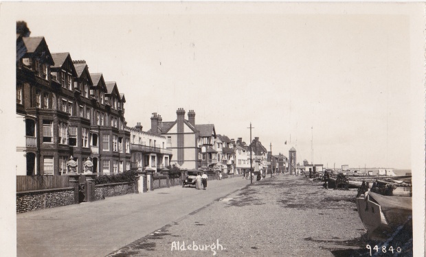 Crag Path, Aldeburgh. Brudenell Terrace, the row of tall houses on left, were built by Newson Garrett . Their red-brick gloom has now been transformed by pastel paints